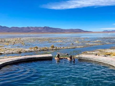 Bathers in the Polques thermal pool