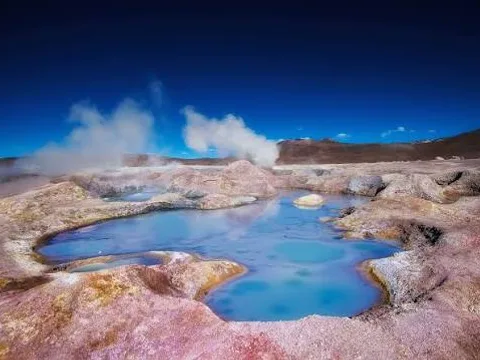 Steaming fumaroles at the Sol de Mañana geysers